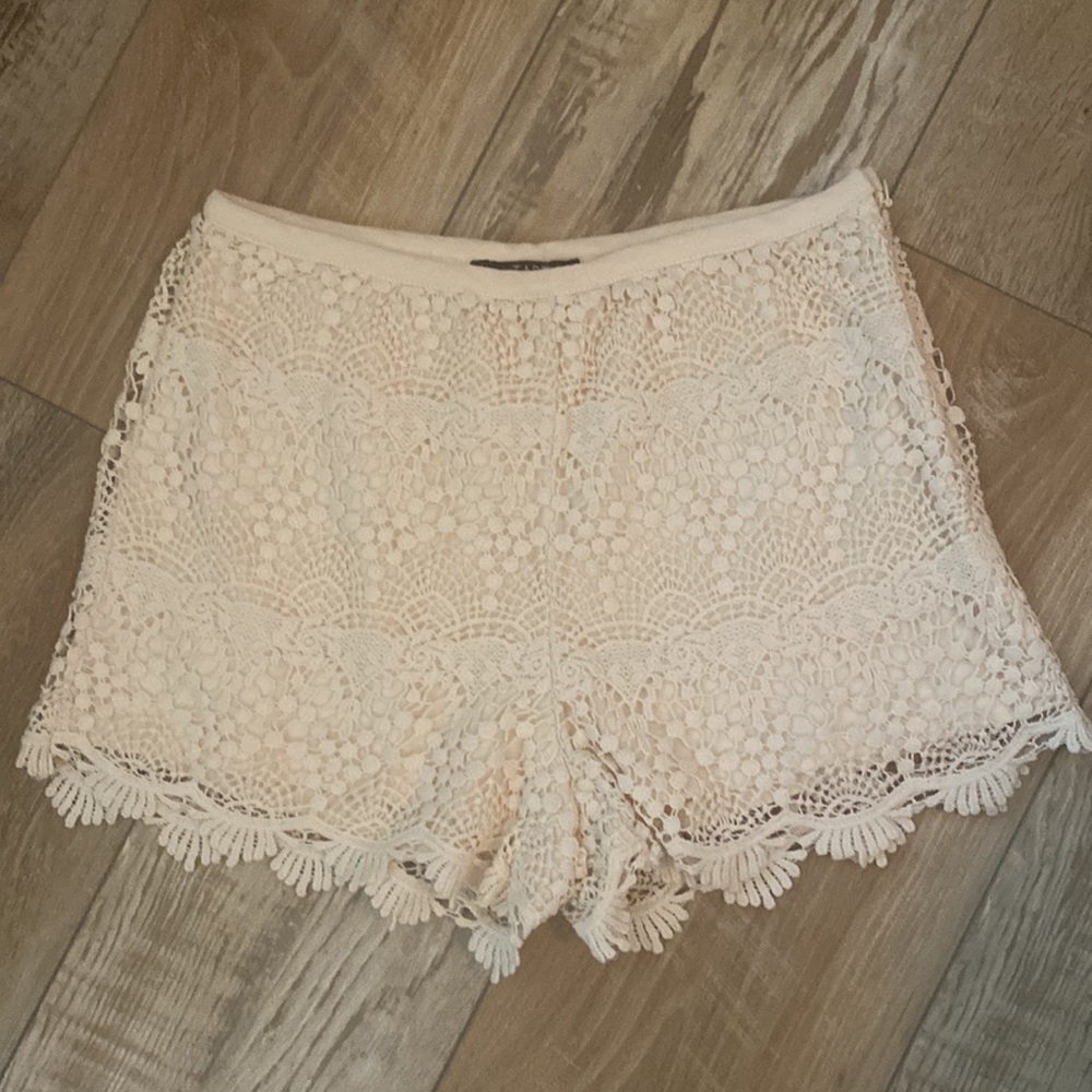 Like new TART cream crochet lace shorts. Size XS.